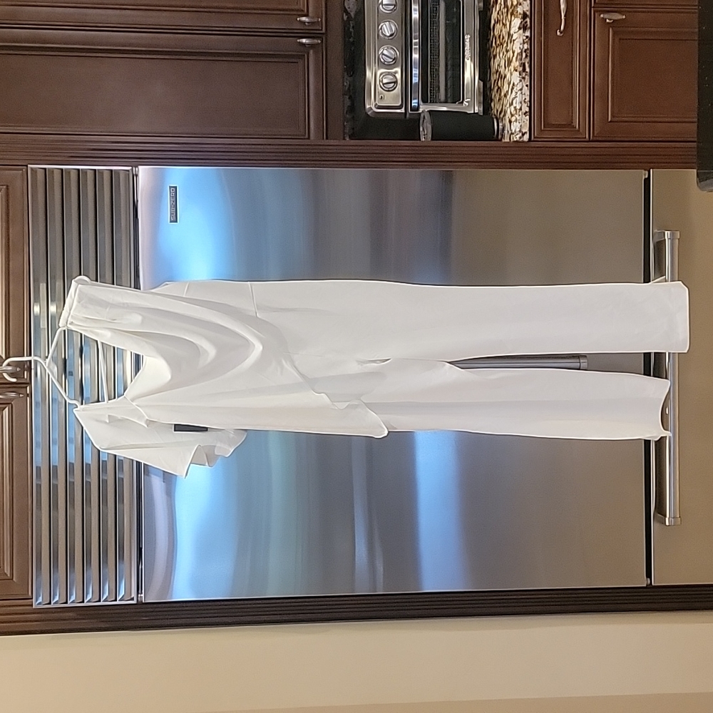 Women's off white jumpsuit. Brand new never worn.